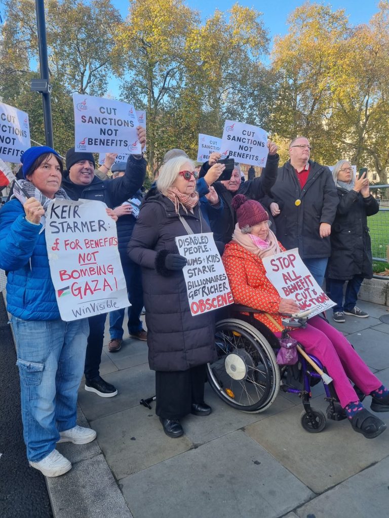 Anti-cuts protesters outside parliament during the Budget Photo: Isai