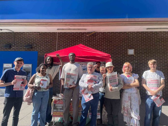 Croydon - Berkay Kartav Lewisham TUSC candidate Jay Coward supporting the socialist campaign in Croydon Photo: Berkay Kartav