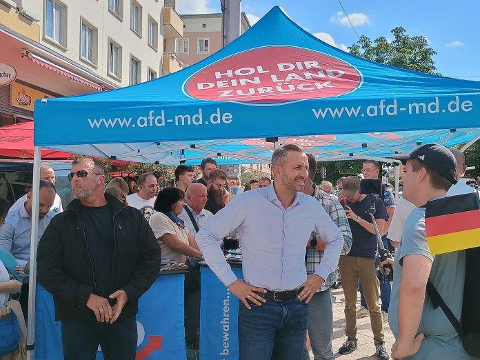 (2026)_AfD_Ulrich_Siegmund_160704907 AfD lead candidate Ulrich Siegmund holding an election rally in Magdeburg Photo: Roy Zuo/CC