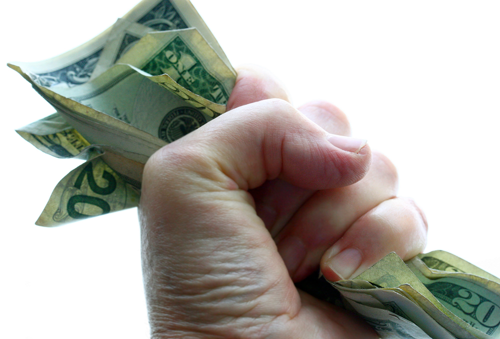 Greed dollars grasping handouts cash Liz West (Creative Commons), credit: Liz West (Creative Commons) (uploaded 02/07/2015)