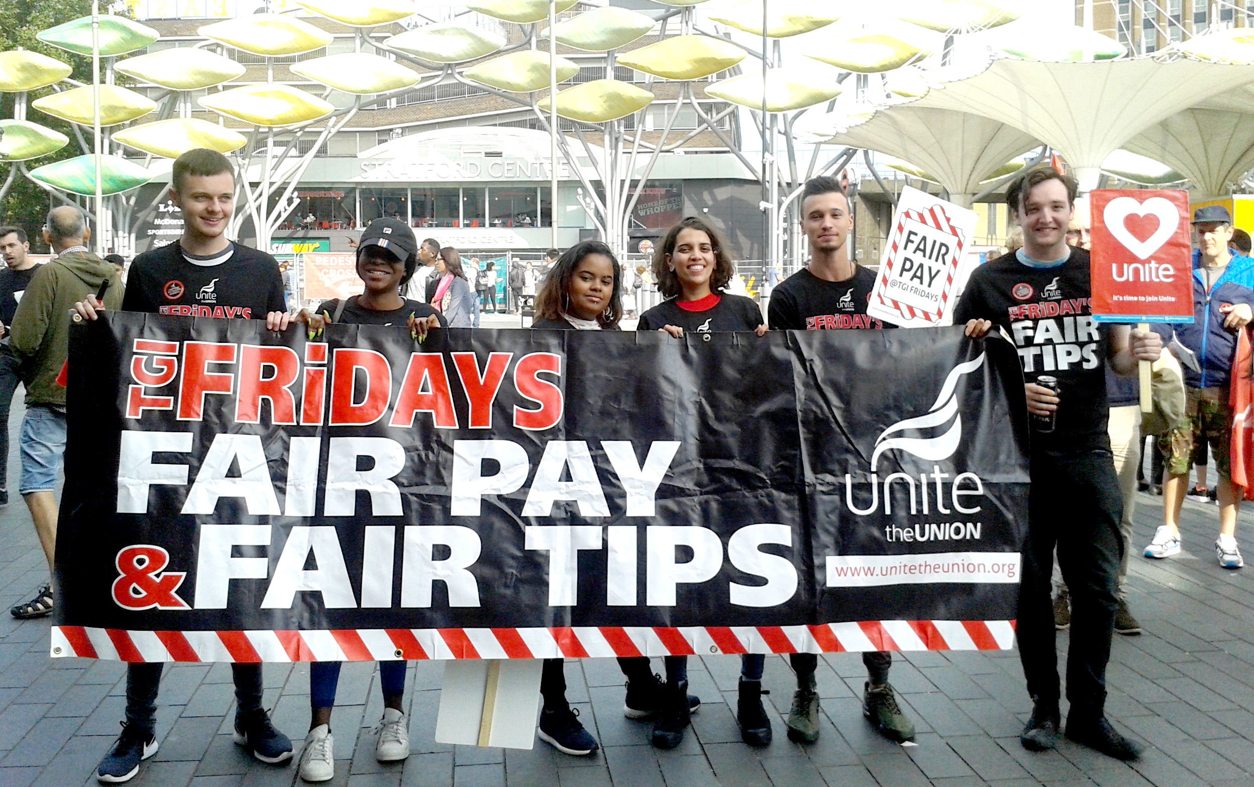 TGIFriday workers at Stratford, London. TGI staff at a number of restaurants have been on strike against cuts in their tips, credit: Pete Mason (uploaded 28/08/2018) TGIFriday workers at Stratford, London. TGI staff at a number of restaurants have been on strike against cuts in their tips, credit: Pete Mason (uploaded 28/08/2018)